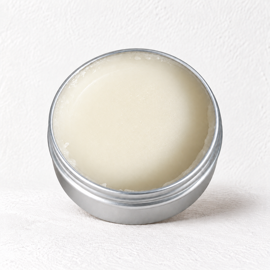 The Prudent Shepherd fragrance-free barrier balm in an open 4 oz silver tin.